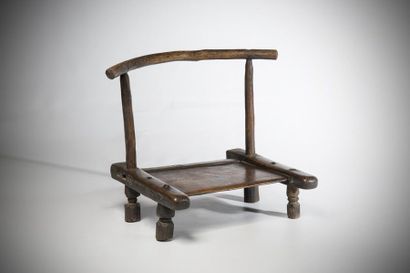 null DAN, Ivory Coast. Low chair used by the Dan and the Guéré. Young girls could...