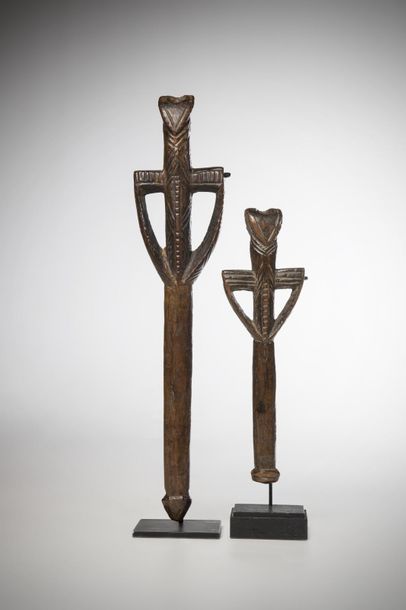 null BWA/NUNUMA/DAFING, Burkina Faso. Two flutes in the shape of a stylized character....