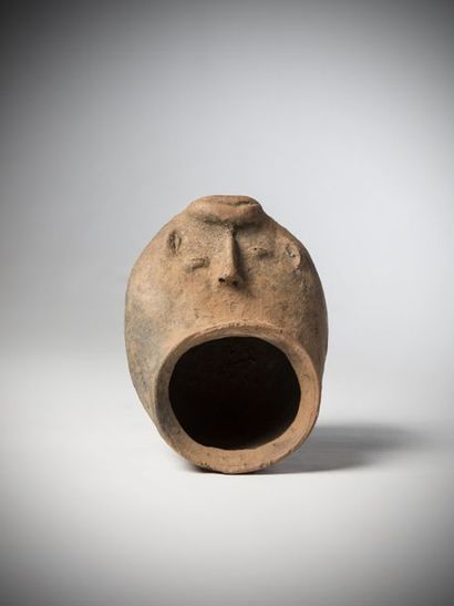 null IGBO-IZZI, Nigeria. Terracotta medicine receptacle representing a face with...