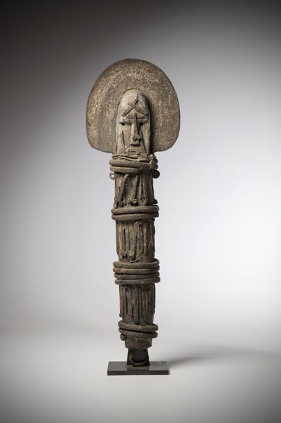 null IGBO, Nigeria. This representation of Ofo with a large halo has the body and...