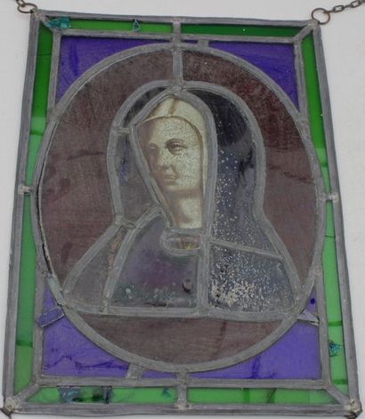 null Stained glass element representing the Virgin or a Holy 
Stained glass window:...