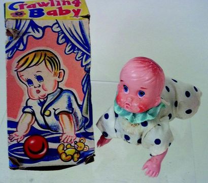 null « Crawling Baby » petit bébé mécanique crapouilleur en celluloïd, L 12 cm avec...