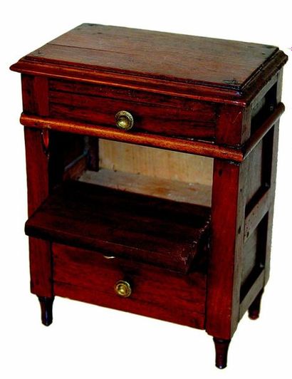 null Nice and rare small mahogany secretary openng on front howing three drawers....