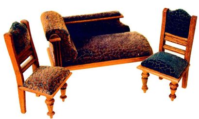 null Set of miniature wooden furniture; including a sofa and two chairs covered in...