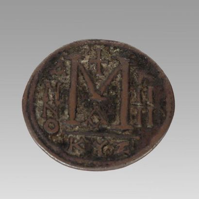 null MONNAIES BYZANTINES
Follis de Justinien 
Avers : Buste casqué et cuirassé de...