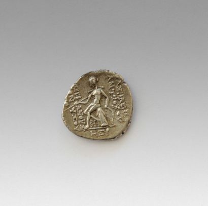 null SYRIA SELEUCIDES
ANTIOCHUS VI

Reverse: Apollo sitting on the left on the Omphalus
Struck...