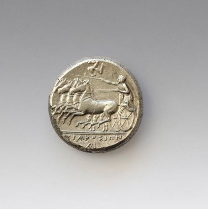 null SYRACUSE
Tetradrachma
Obverse: Persephone's head surrounded by dolphins on the...