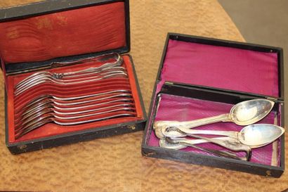 null Set of mismatched forks and spoons and two silver
sugar tongs Weight: 1100 ...