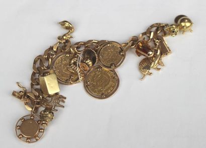 null BRACELET bracelet decorated with eleven charms and three mounted gold coins,...