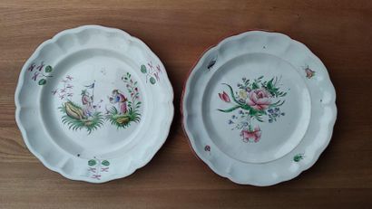 Two earthenware dishes of round shape contoured...