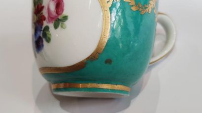 null SEVRES
CUP and its saucer in soft porcelain with reserved floral decoration...