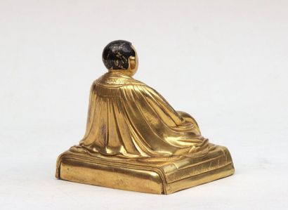 null Sculpture representing a LAMA sitting on a cushion-shaped base, gilt bronze...