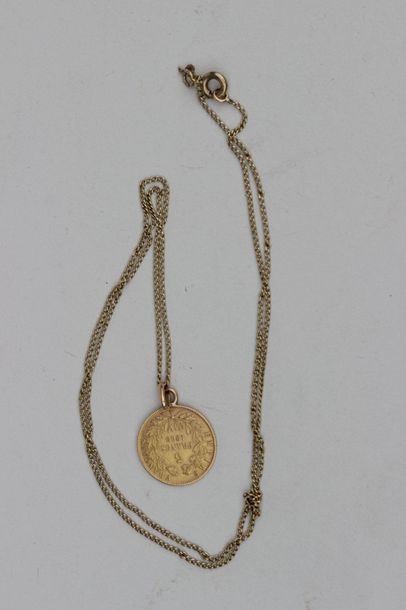 null CHAIN in 750°/00 yellow gold and 5 Francs gold coin mounted as a pendant. Weight:...