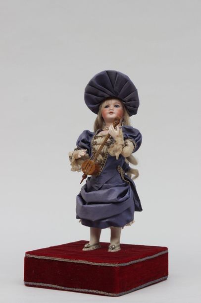 null "Little musician " French-made music automaton of the brand ROULLET DECAMPS...