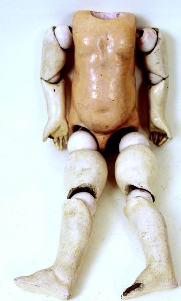 null -Antique French baby body with eight joint balls and fixed wrists. H 45 cm.
Antique...
