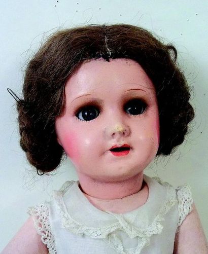 null SFBJ cardboard head doll, unsigned, open mouth, blue moving glass eyes, articulated...