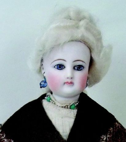 null -Beautiful Parisian Doll with a swivel head in pressed biscuit from the house...