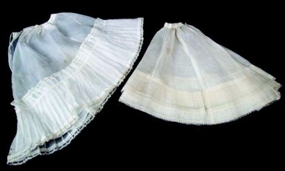 null Two beautiful Parisian dolls petticoats, one with pleated stockings and the...