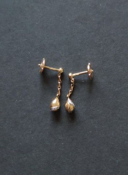 Pair of earrings in 750°/°° yellow gold set...