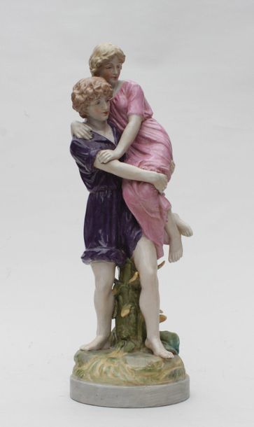 null GROUP in polychrome enamelled porcelain representing a couple dressed in the...