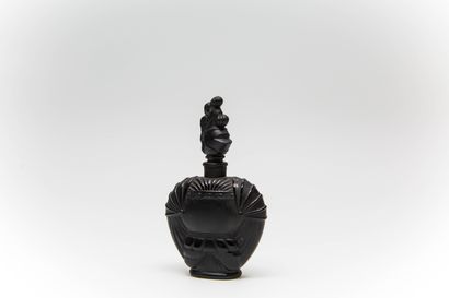  Ciro - "The Knight of the Night" - (1920s) 
Opaque black pressed moulded glass flask...