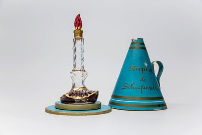 null Schiaparelli - "Sleeping" - (1938)

Surrealist bottle in molded colourless pressed...