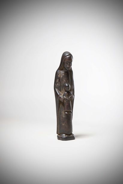 null MAKONDA (Tanzania/Mozambique)

STATUE of the Virgin holding her child on her...