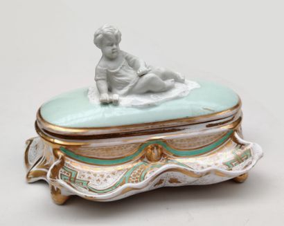 null 
PARIS
INK covered in pale green and gilded enamelled porcelain, the lid uncovering...