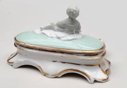 null 
PARIS
INK covered in pale green and gilded enamelled porcelain, the lid uncovering...