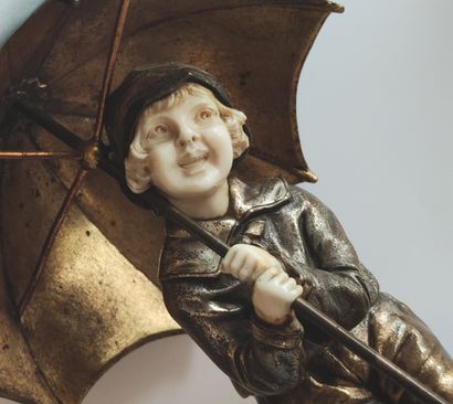 null 
Dimitre CHIPARUS (1886-1947)
Petite fille au parapluie
Epreuve chryséléphantine...