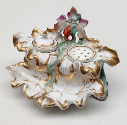 null 
PARIS
INK in polychrome and gilded enamelled porcelain with an animated shape
decorated...