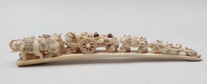 null 
OKIMONO in ivory carved in a point of defense representing the gods of happiness...