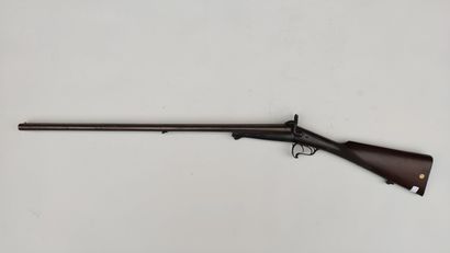 null 
Shotgun with pinfire, two shots, 12 gauge, ribbon barrels, locks signed "Verney...
