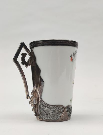 null 
Porcelain Mug, with silver metal frame, decorated with a wise man and inscriptions,...