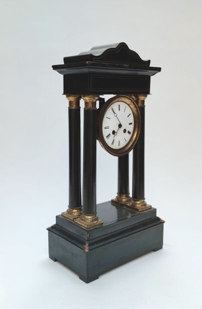 null 
Portico clock in blackened wood and inlaid with threads, Napoleon III period
49...