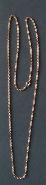 null 
CHAIN with medal and pendant Egypt in yellow gold 750°/°°, Weight : 17,4 g
Chain...