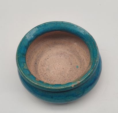 null 
Glazed stoneware bowl with Chinese characters on the reverse (chips on the...