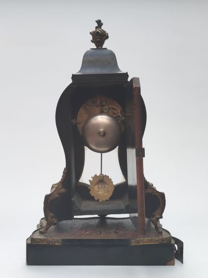 null 
Small clock of cartel form and its moving support in marquetry of Boulle style,...
