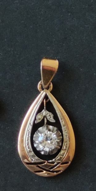  Small pendant in yellow and white gold 750°/00...