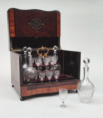 null 
Wooden liquor cabinet with 4 decanters and 14 glasses on a stand,

end of the...