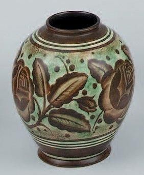 CATTEAU Charles (1880-1966) Vase en faïence fine émaux mats, de forme balustre. Décor...