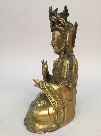 null 
CHINA - MING period (1368 - 1644), 17th century
Important gilded bronze statuette...