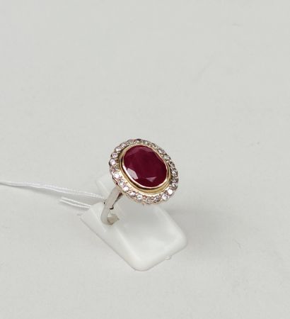 null 
Ring in yellow and white gold 750°/00 set with a 6.28 carat Burmese ruby and...