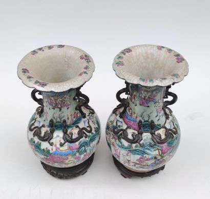 null 
Pair of cracked porcelain VASES with polychrome enamelled decoration of characters...