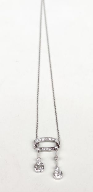 
A pendant in white gold 750°/00 set with...