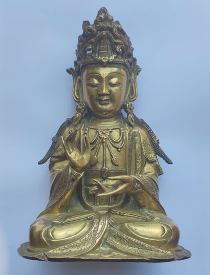 null 
CHINA - MING period (1368 - 1644), 17th century
Important gilded bronze statuette...