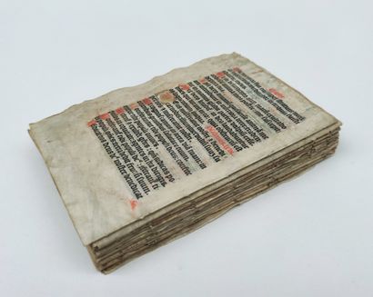 null 
Antique book incomplete, the Latin text printed on parchment and decorated...