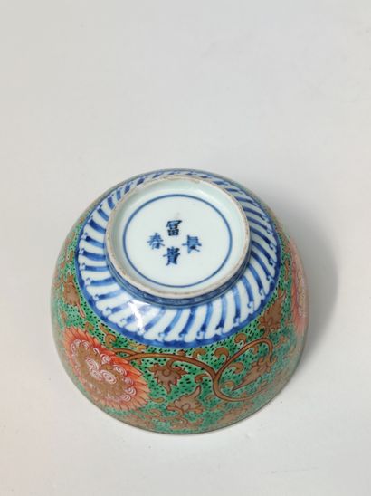 null 
Porcelain BOWL with polychrome enamelled decoration on the outside of foliage...