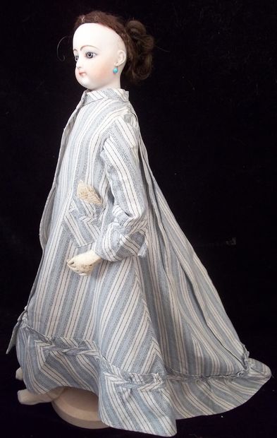 null 
Parisian doll from the House of Emile Louis JUMEAU, head in pressed biscuit...