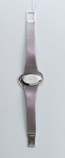 null 
Montre bracelet de dame en or blanc 750°/00, marque ETERNA
Lunette de forme...